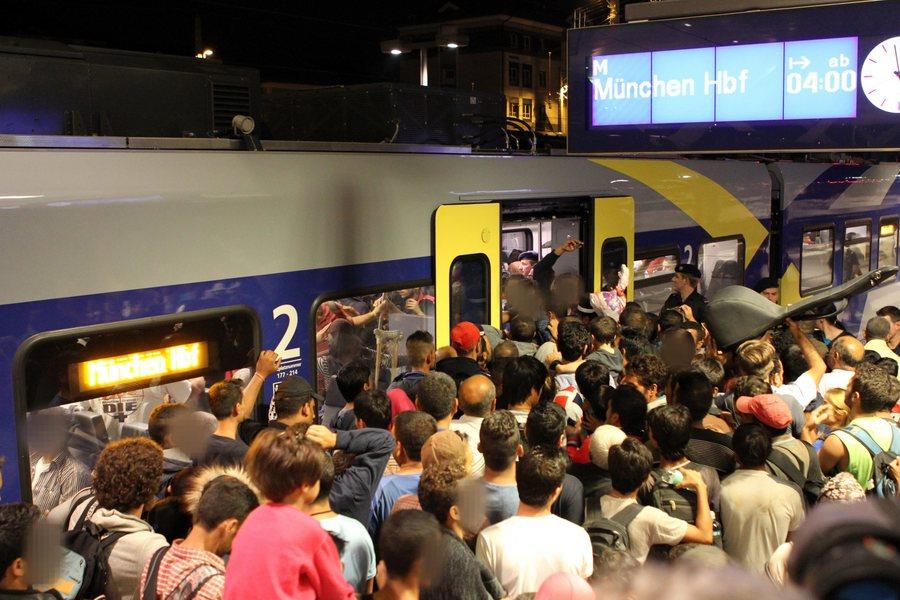 epa04907406 Migrants on the platform at the main railway station in Salzburg, Austria, 01 September 2015. Between 1500 to 2000 refugees have spent the night, or at least a few hours, at the railway station in Salzburg, before proceeding on their journey to Germany. Hungarian police on 01 September 2015 closed the main train station in Budapest from where scores of migrants were hoping to travel to Western Europe. Hundreds boarded trains to Austria and Germany. Austrian police at the Vienna station and German police in Rosenheim, on the border with Austria, apparently made no effort to block or register any refugees. EPA/FMT-PICTURES/PM no restriction apply